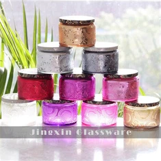 Bunte Glasgefäße mit Deckel